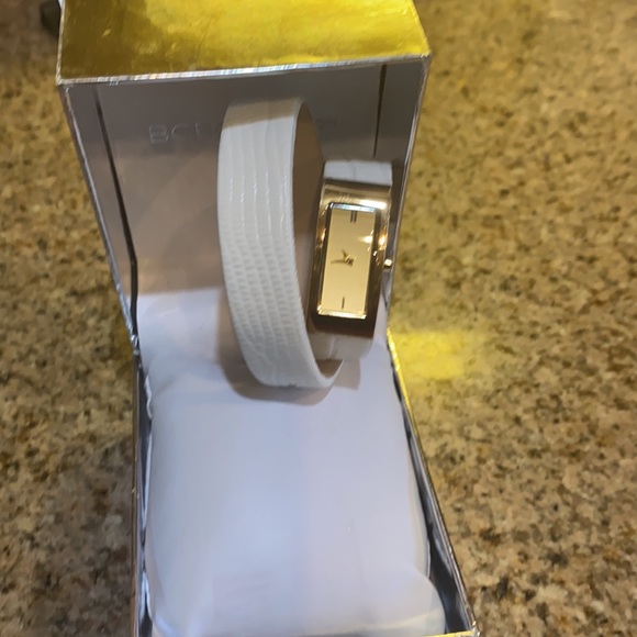 BCBGeneration. NWT.  Double strap watch.  Gold face w white. In box.  See pics main image 6